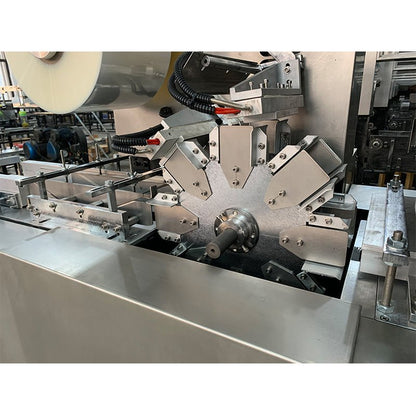 Automatic three - dimensional packaging machine perfume box packaging machine