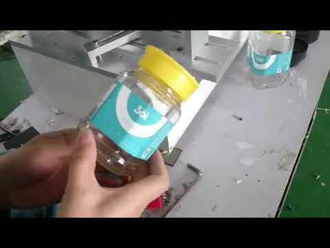 Semi-auto flat rolling bottle labeling machine , PET square bottle label applicator
